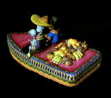 Skeleton Couple and their dog in a rowboat